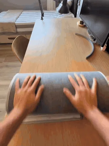 Foot and leg warmer unfolding, wrapping around the legs, and adjusting from the front controls