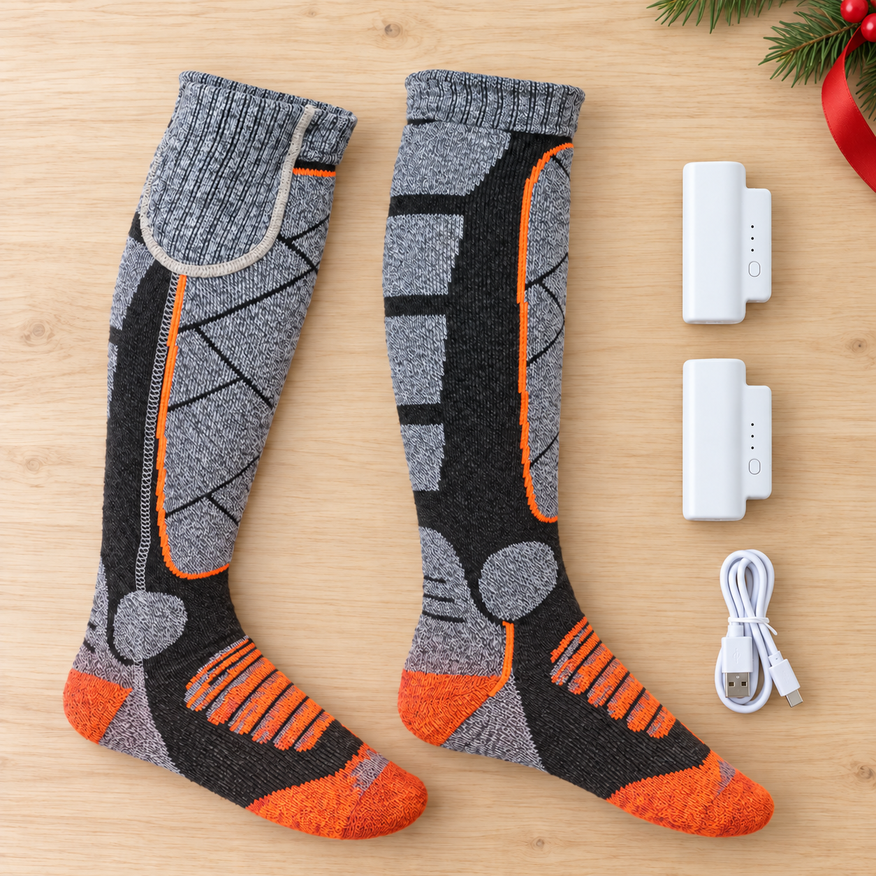 Heated sock package contents with two batteries and USB cable