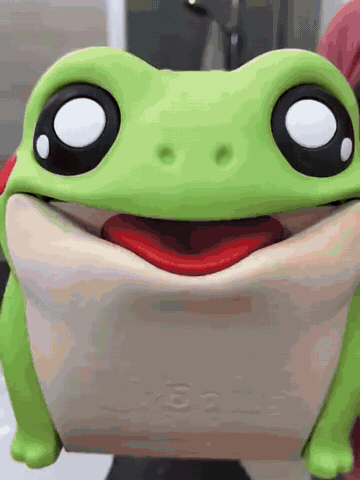 Frog tissue dispenser being refilled and used