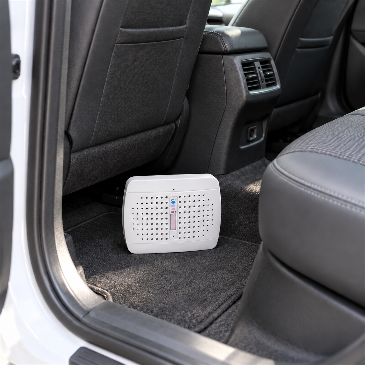 Mini dehumidifier in a car interior