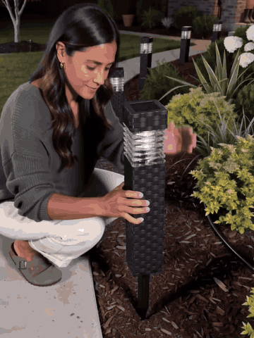 Solar pathway light installation and nighttime demonstration