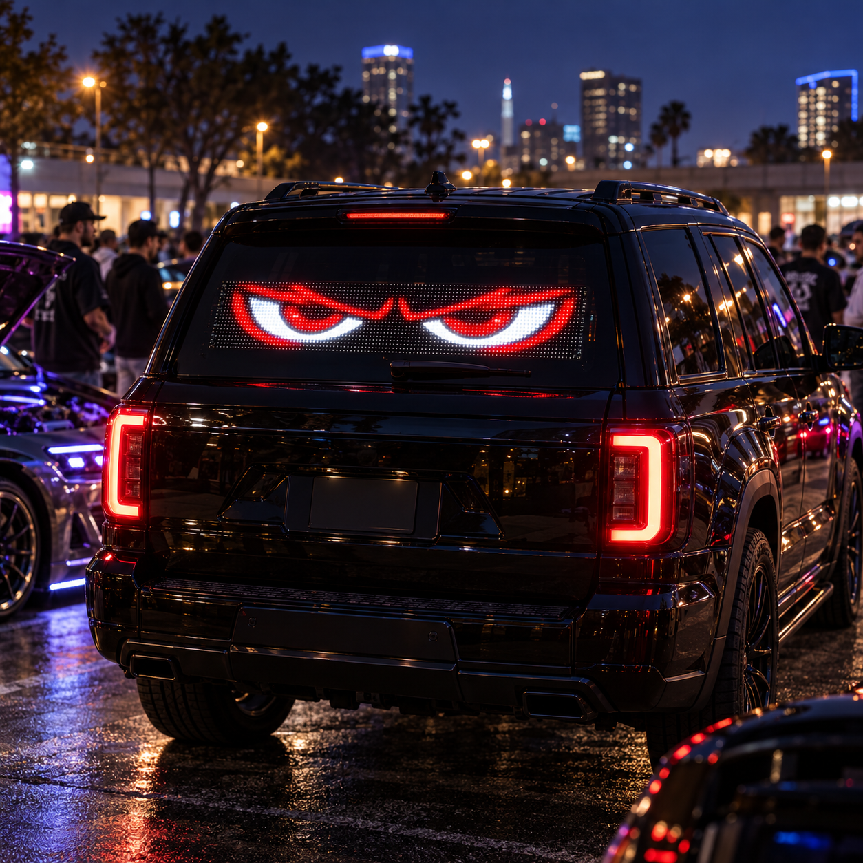Red animated LED eyes displayed at an evening car meet