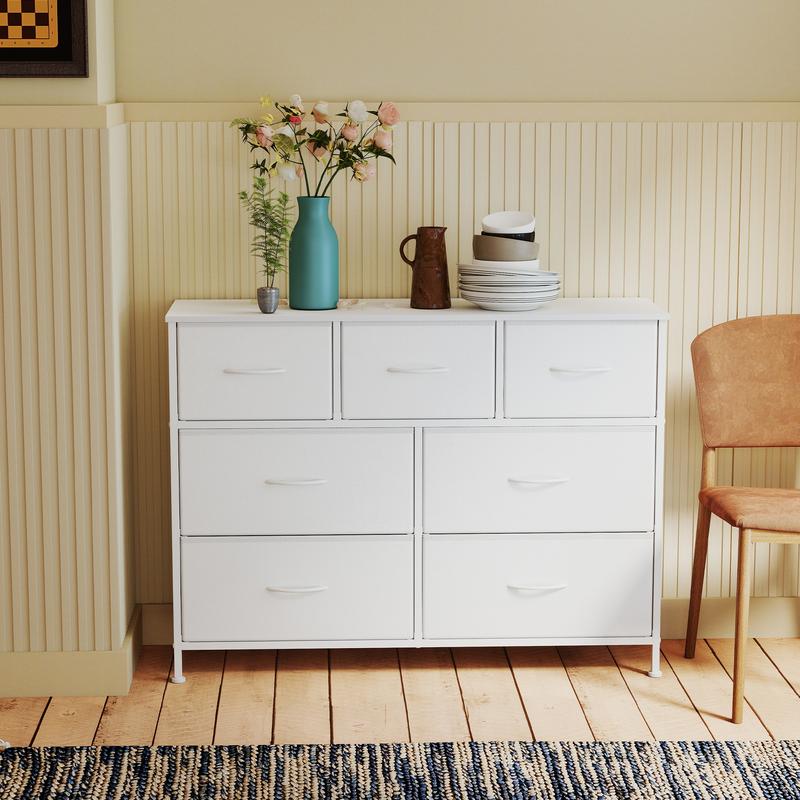 Cómoda de siete cajones, mueble de almacenamiento para dormitorio, fabricada en acero, tablero de fibra de densidad media y tela no tejida, adecuada para dormitorios, armarios, pasillos y salas de estar.