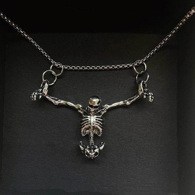 Silver-tone articulated skeleton pendant necklace