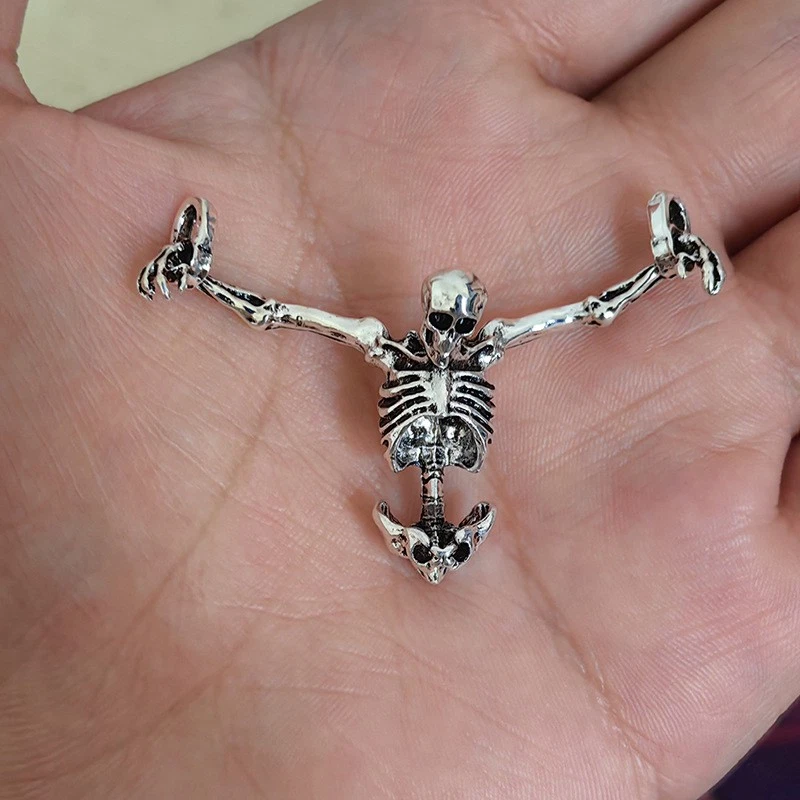 Silver-tone articulated skeleton pendant necklace
