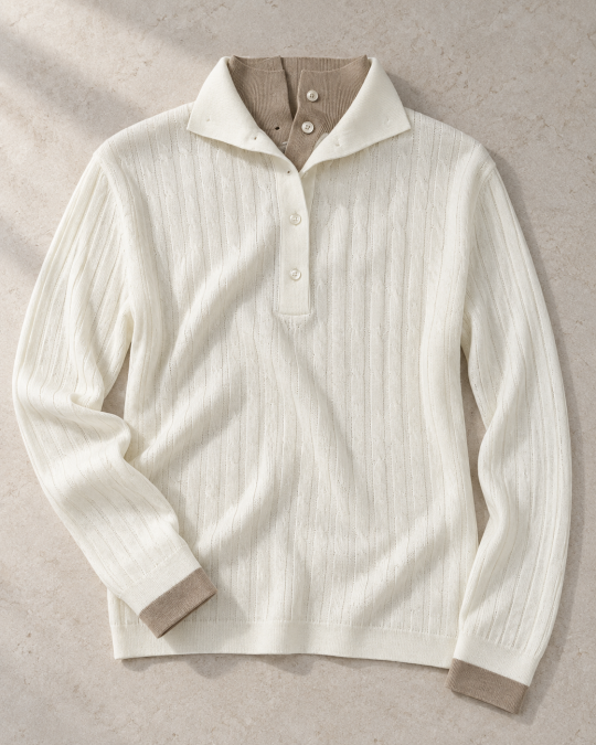 The Contrast-Collar Polo in ivory and taupe, front editorial view.