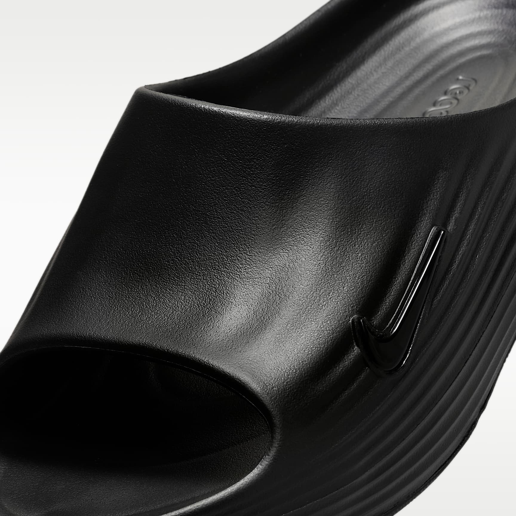 Nike ReactX Rejuven8 Slides (Herren) – Schwarz/Schwarz/Schwarz