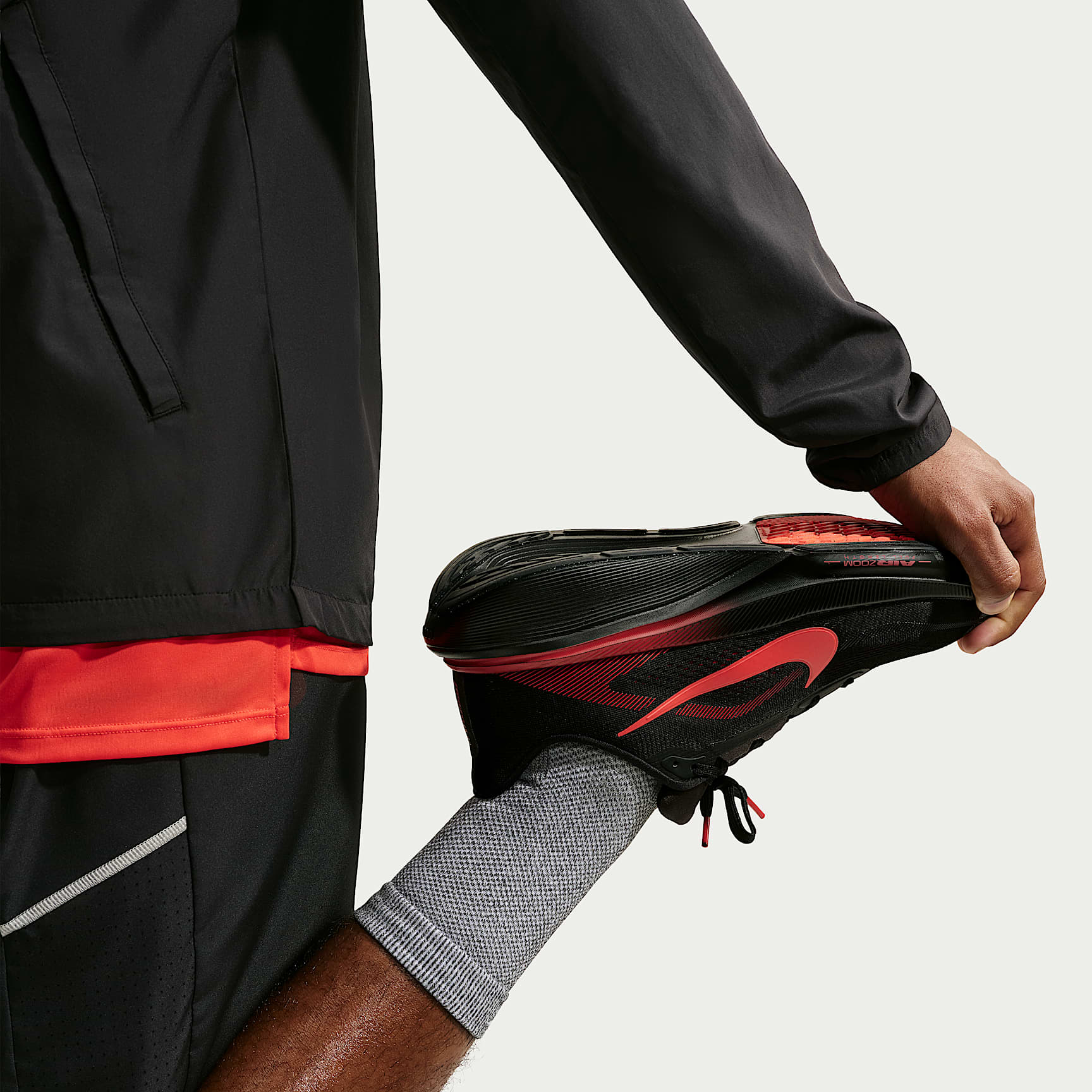 Nike Pegasus 42 Straßenlaufschuh (Herren) – Schwarz/University Red/Wolf Grey/Bright Crimson