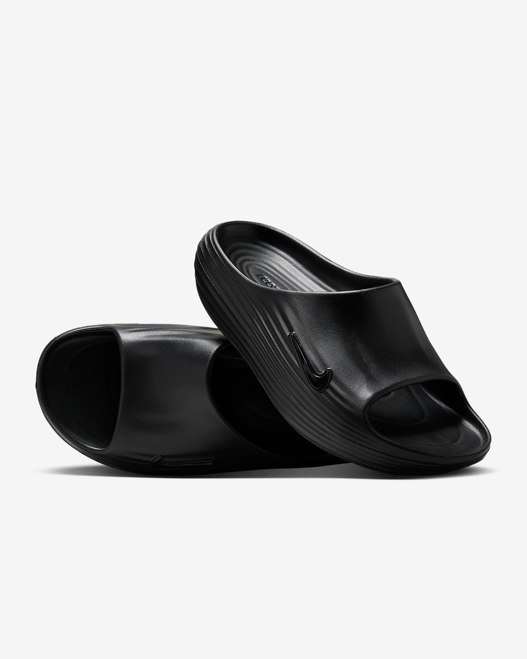 Nike ReactX Rejuven8 Slides (Herren) – Schwarz/Schwarz/Schwarz