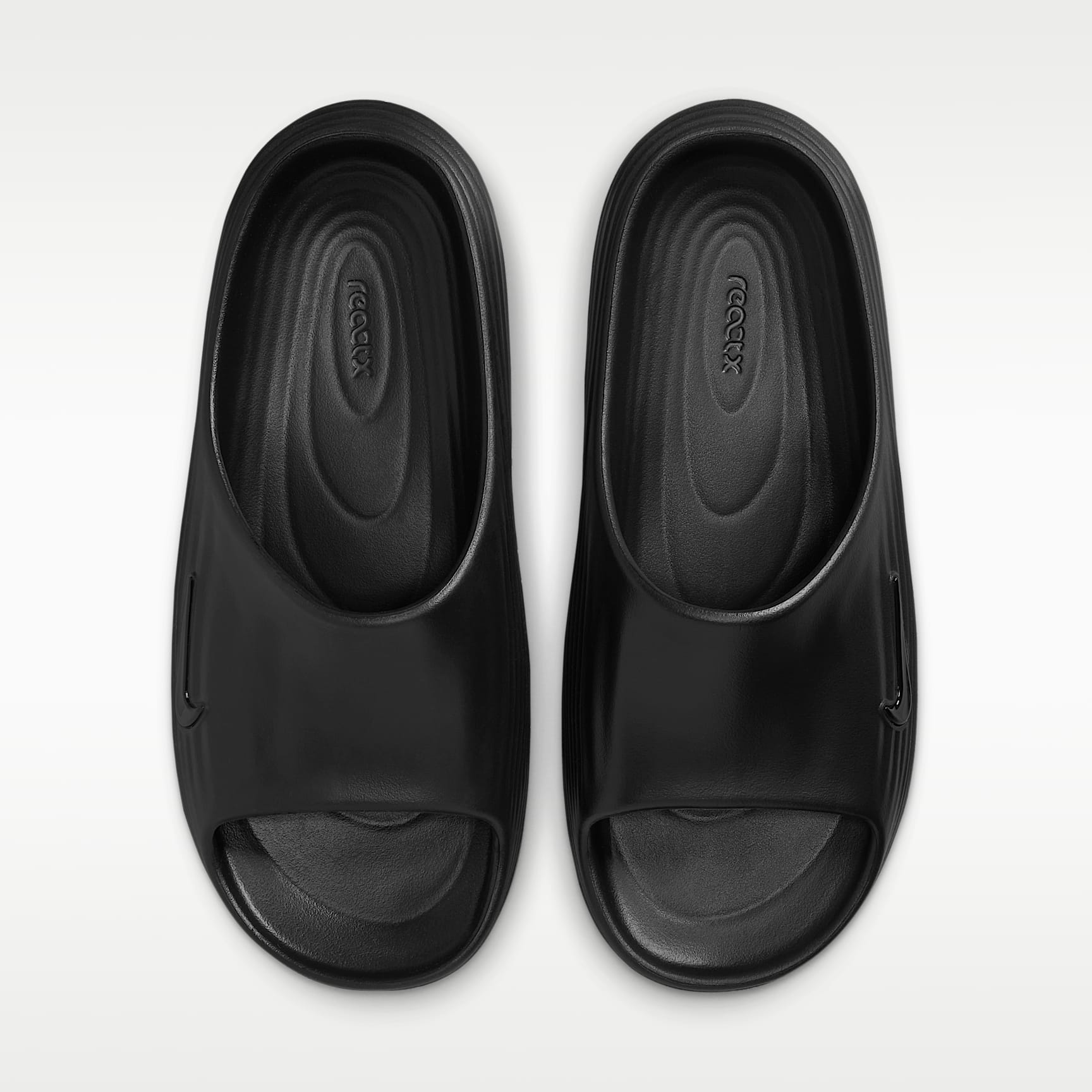 Nike ReactX Rejuven8 Slides (Damen) – Schwarz/Schwarz/Schwarz