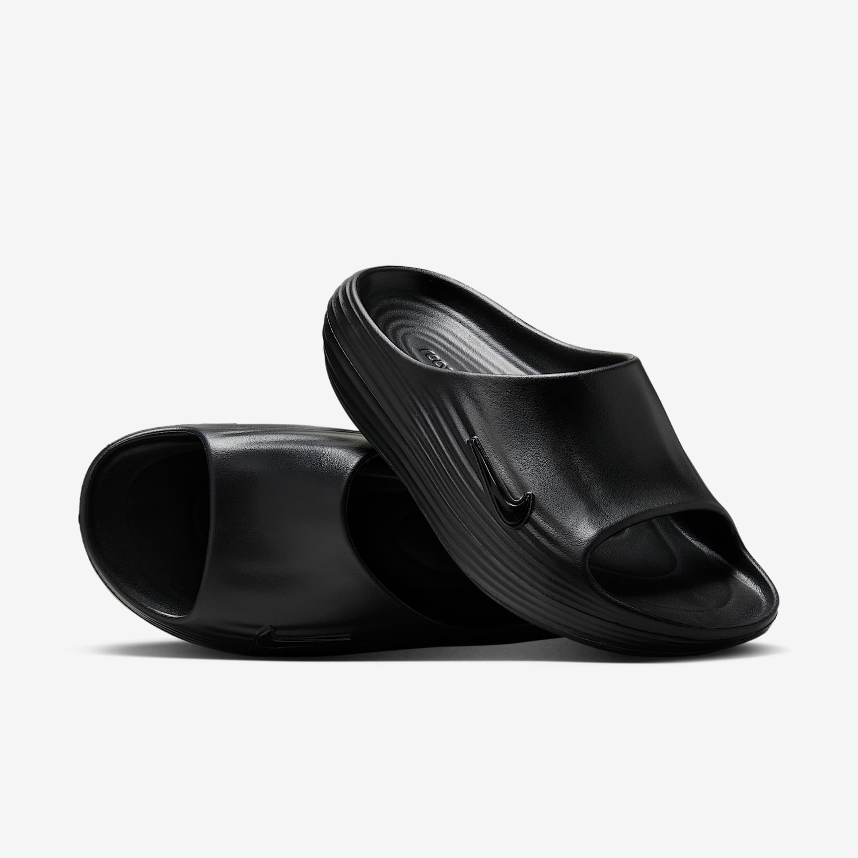Nike ReactX Rejuven8 Slides (Herren) – Schwarz/Schwarz/Schwarz