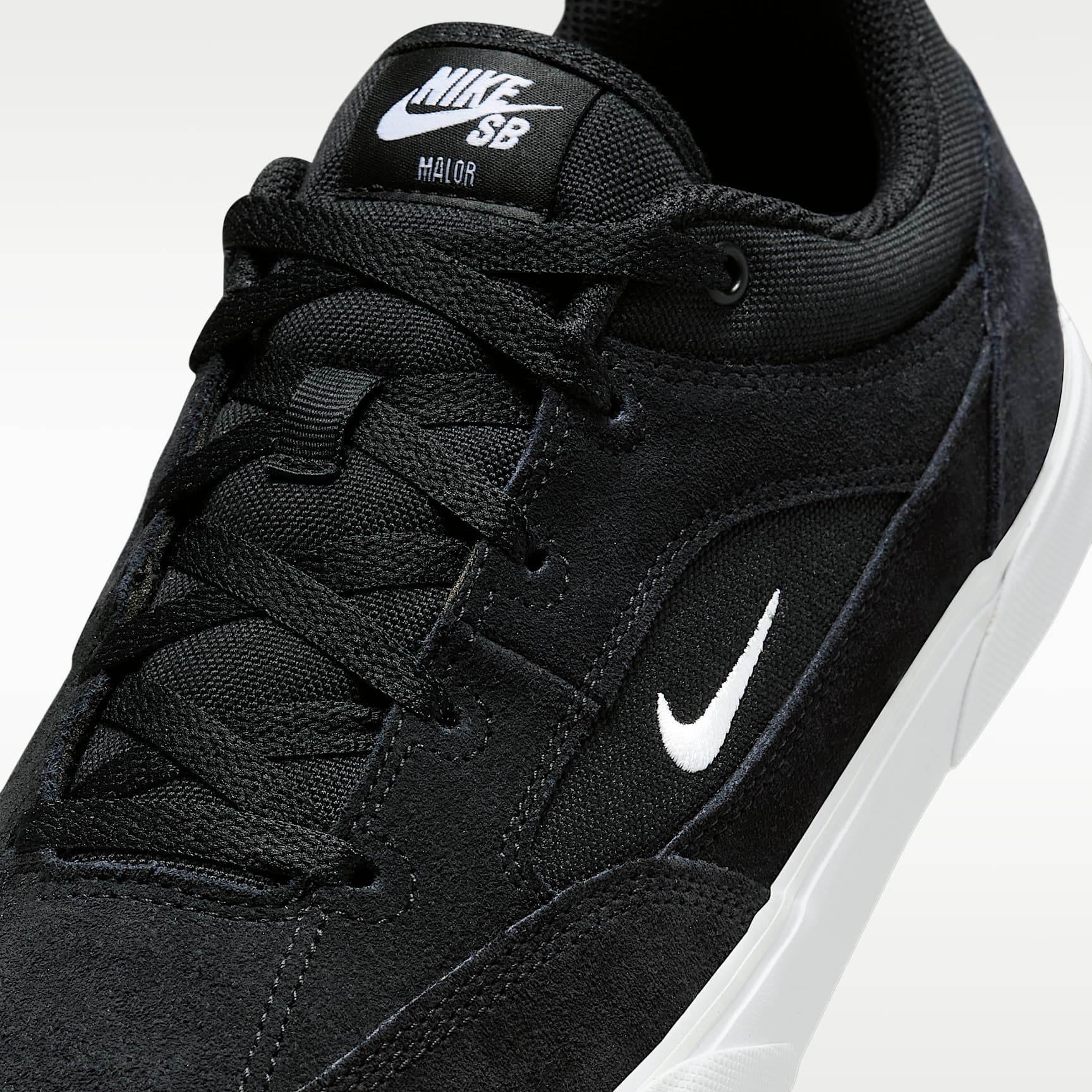 Nike SB Malor Skateboardschuh – Schwarz/Schwarz/Weiß/Weiß