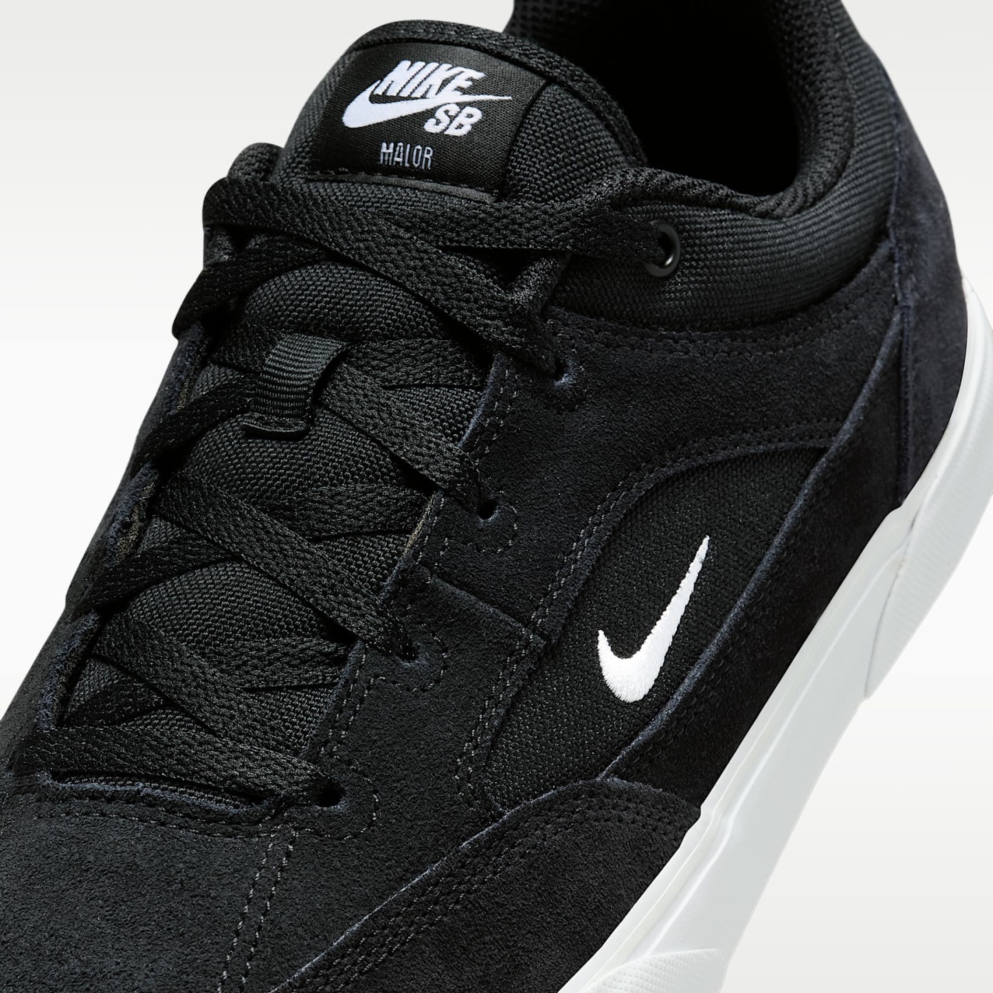 Nike SB Malor Skateboardschuh – Schwarz/Schwarz/Weiß/Weiß