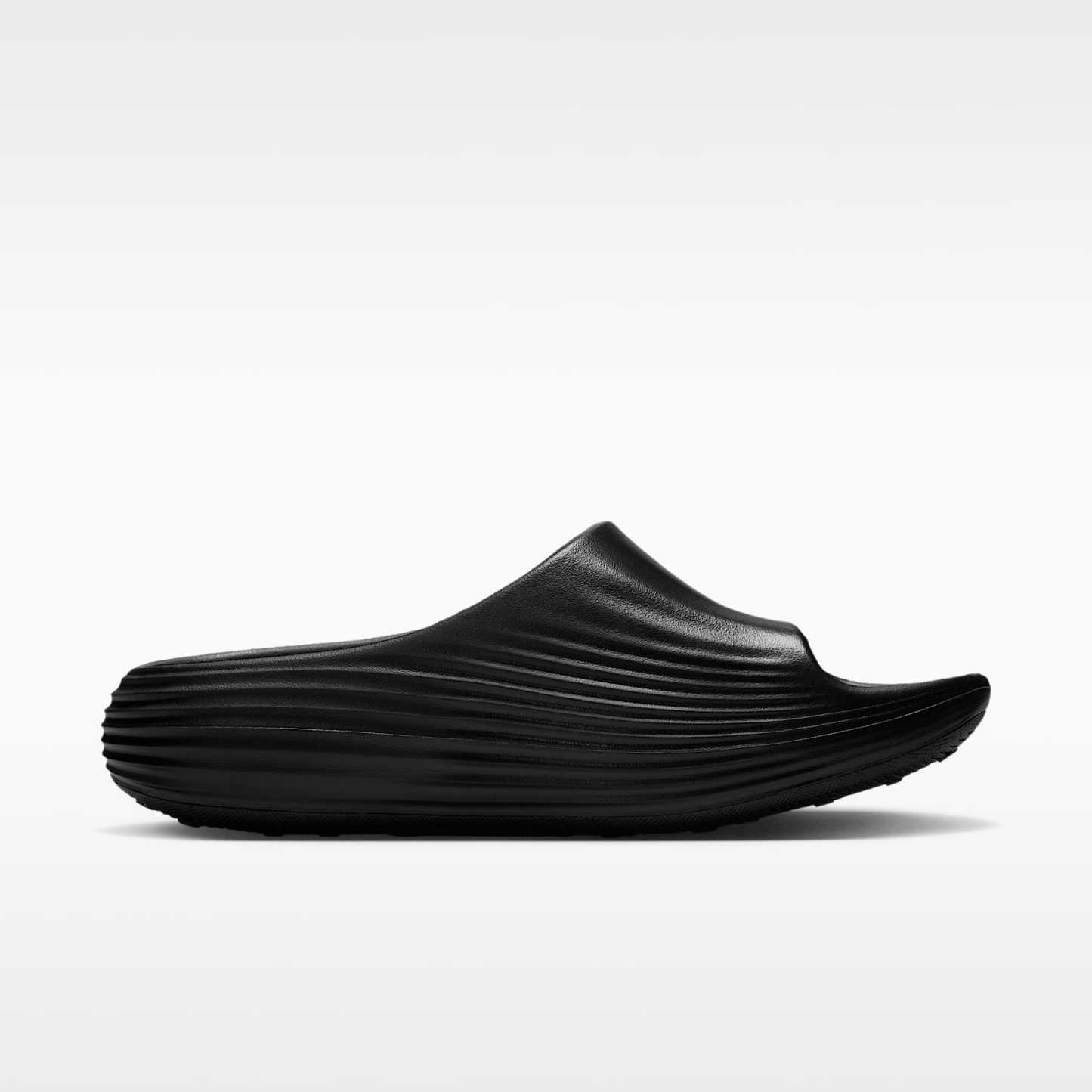 Nike ReactX Rejuven8 Slides (Damen) – Schwarz/Schwarz/Schwarz