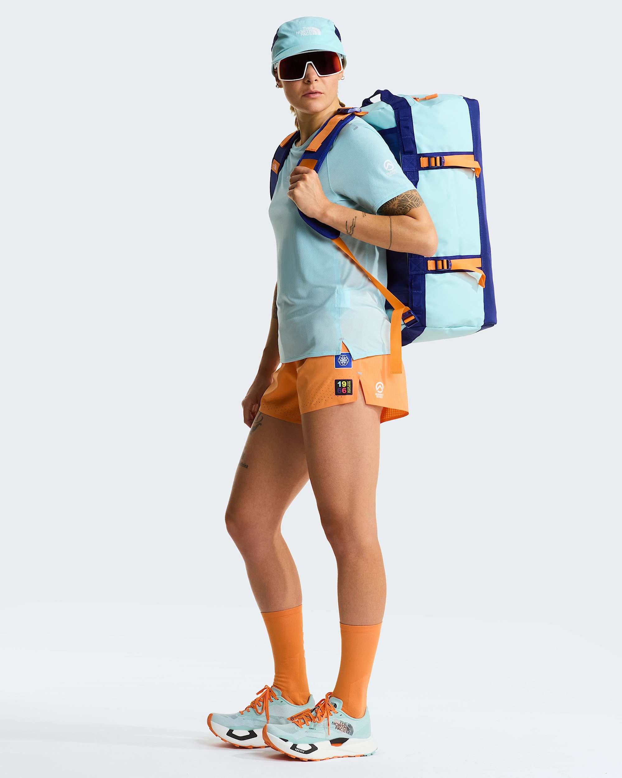 Base Camp Duffel-Tasche 50L – S – Canal Blue-Bold Blue-Papaya