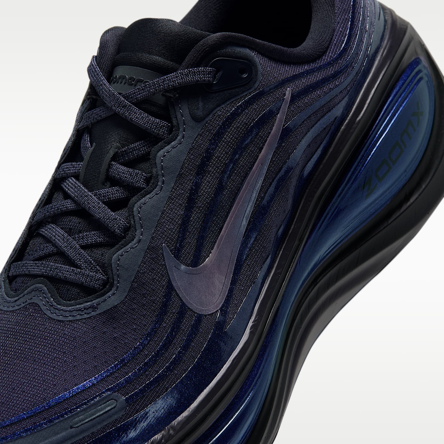 Nike Vomero Plus Straßenlaufschuh (Herren) – Gridiron/Schwarz/Team Black/Multi-Color