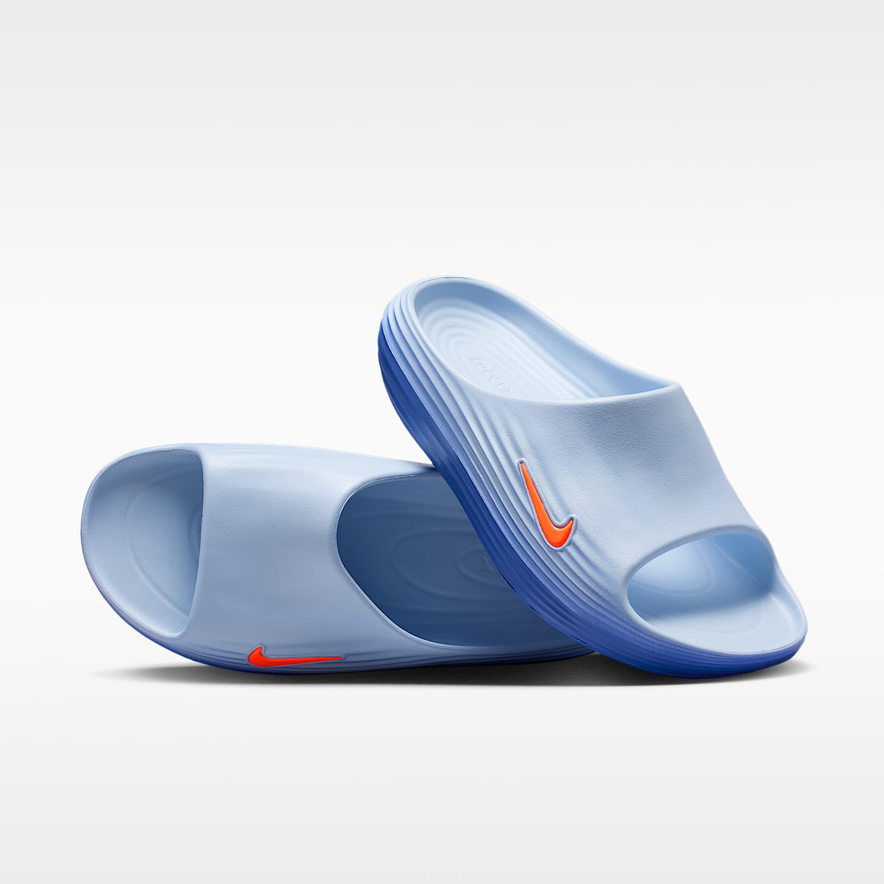 Nike ReactX Rejuven8 Slides (Herren) – Hydrogen Blue/Blue Crystal/Lapis/Total Orange