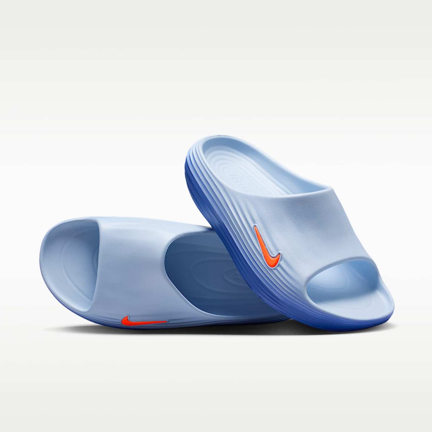 Nike ReactX Rejuven8 Slides (Herren) – Hydrogen Blue/Blue Crystal/Lapis/Total Orange
