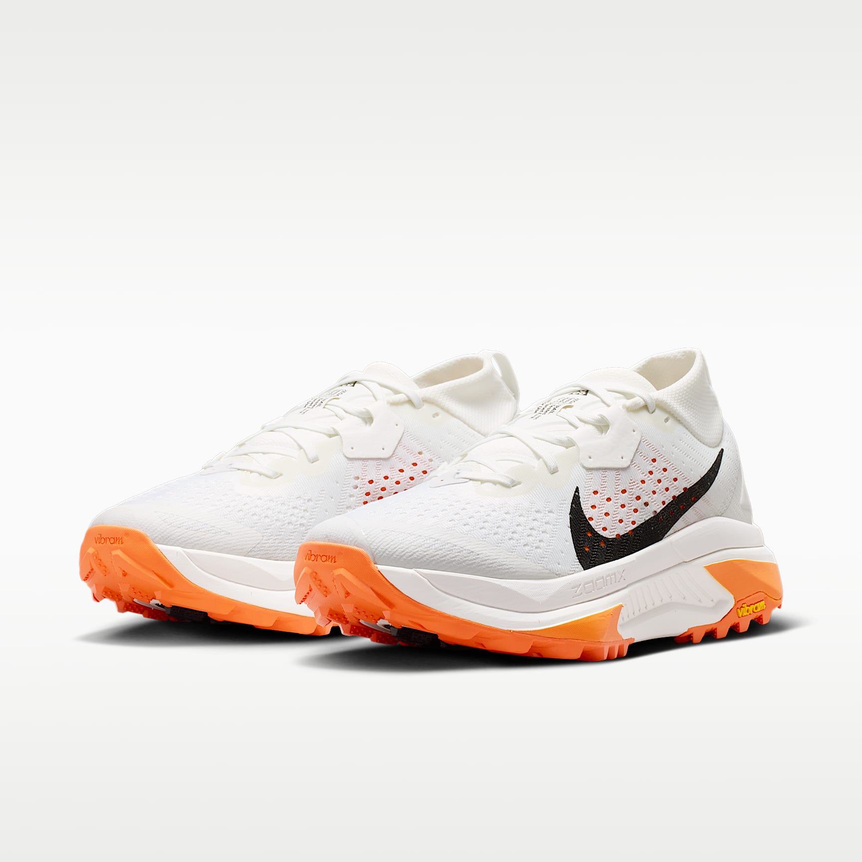 ACG Zegama Trail Traillaufschuh (Damen) – Summit White/Phantom/Safety Orange/Schwarz