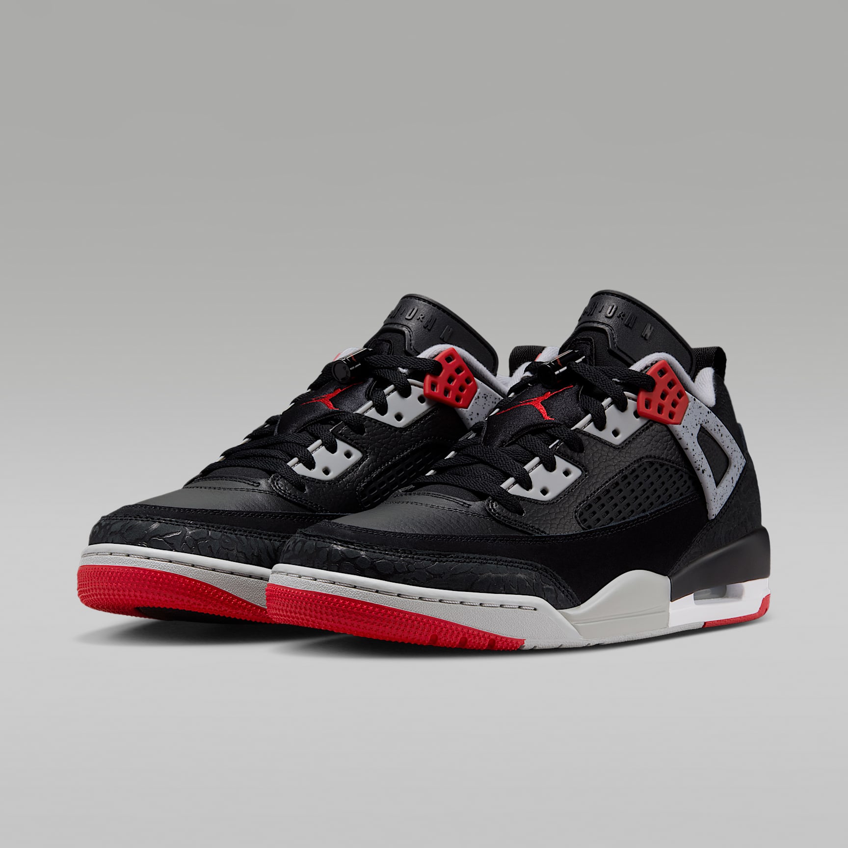 Jordan Spizike Low Herrenschuh – Schwarz/Wolf Grey/Weiß/Gym Red