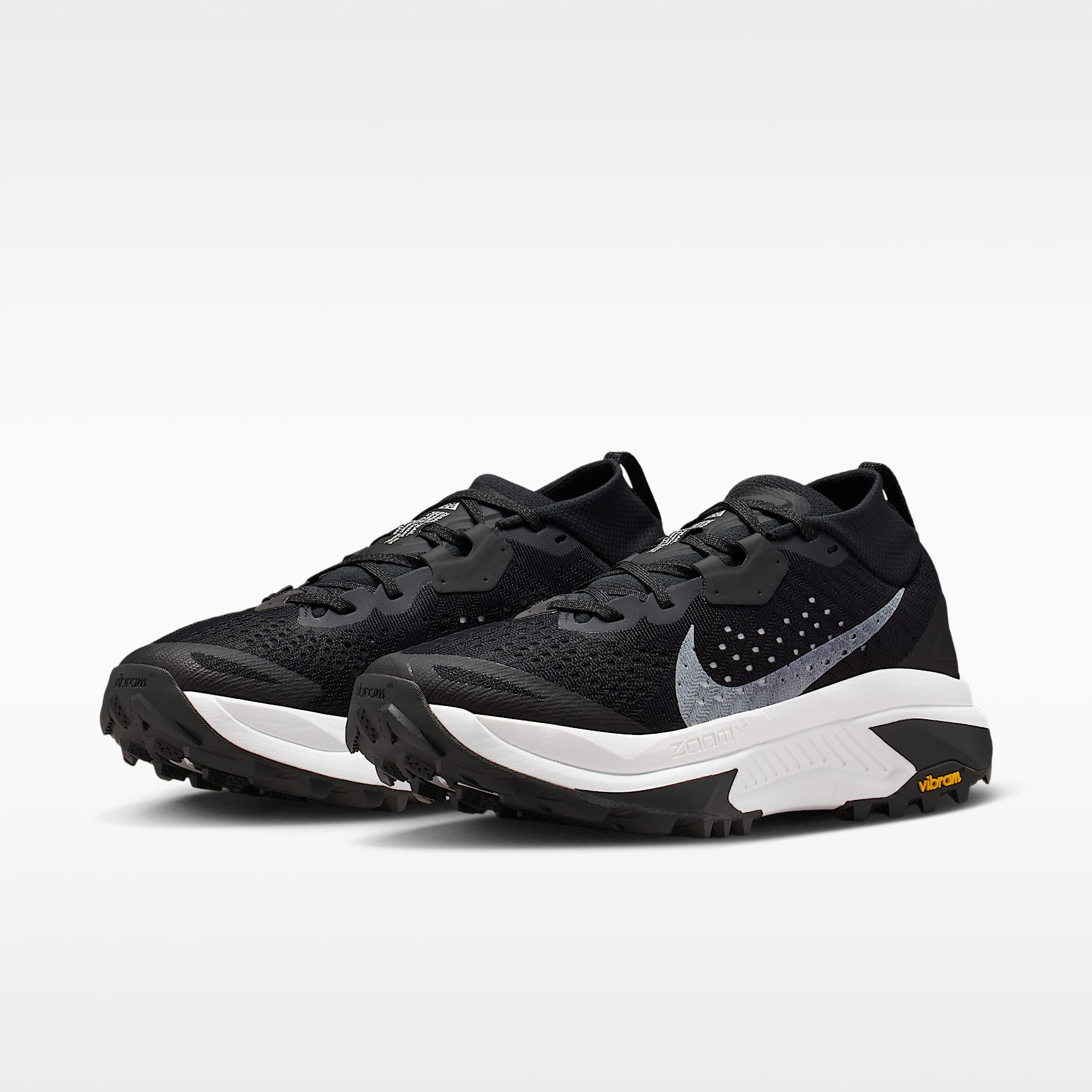 ACG Zegama Trail Traillaufschuh (Damen) – Schwarz/Safety Orange/Anthracite/Summit White