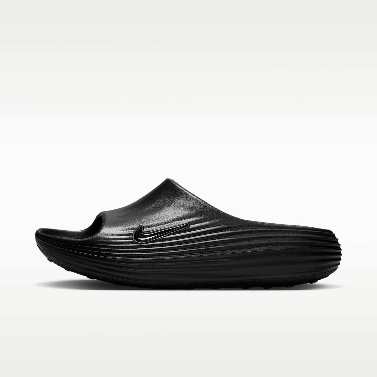 Nike ReactX Rejuven8 Slides (Damen) – Schwarz/Schwarz/Schwarz