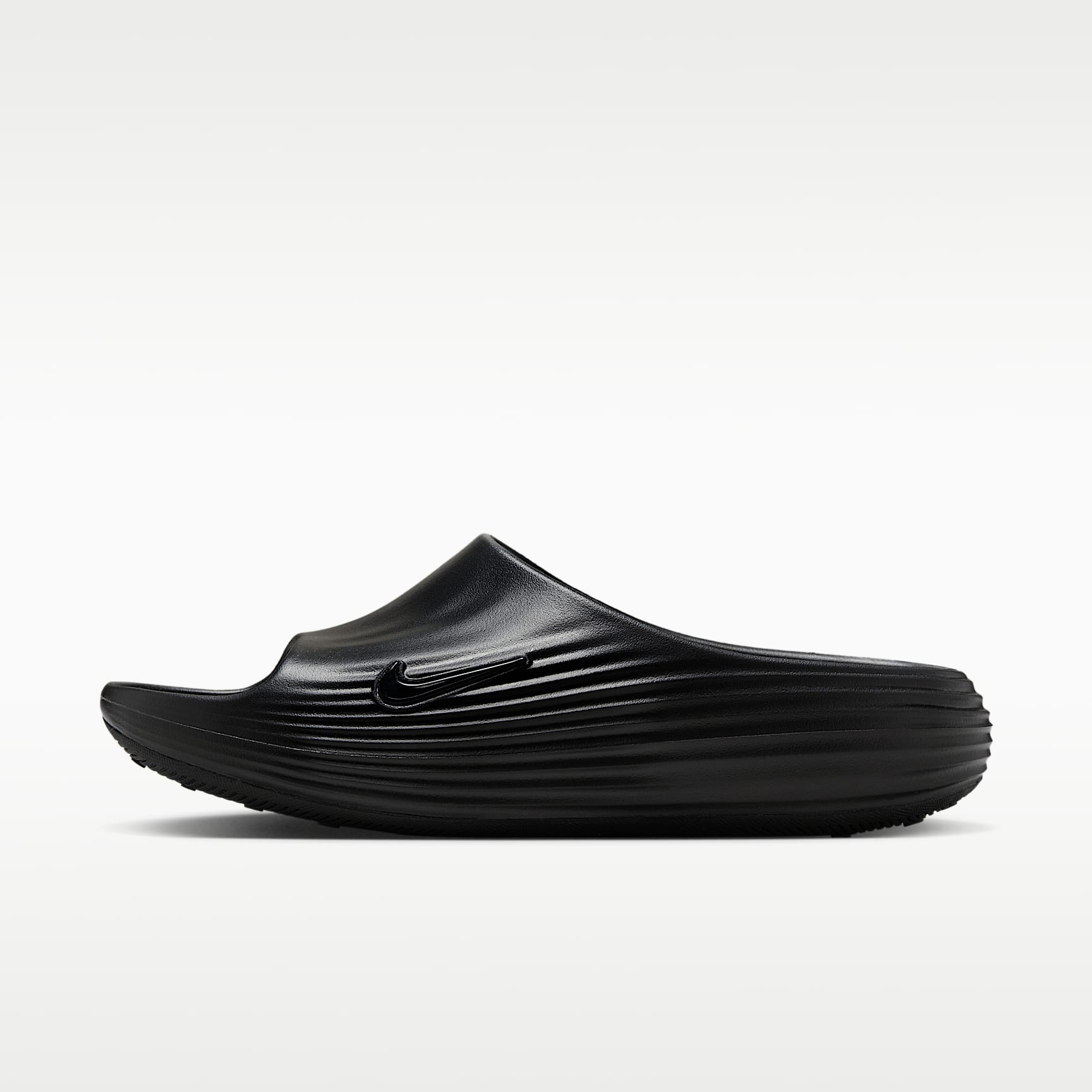 Nike ReactX Rejuven8 Slides (Herren) – Schwarz/Schwarz/Schwarz