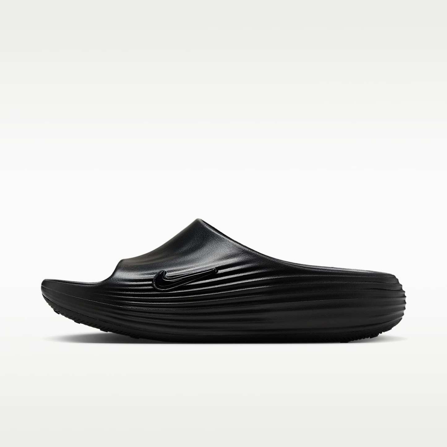 Nike ReactX Rejuven8 Slides (Herren) – Schwarz/Schwarz/Schwarz