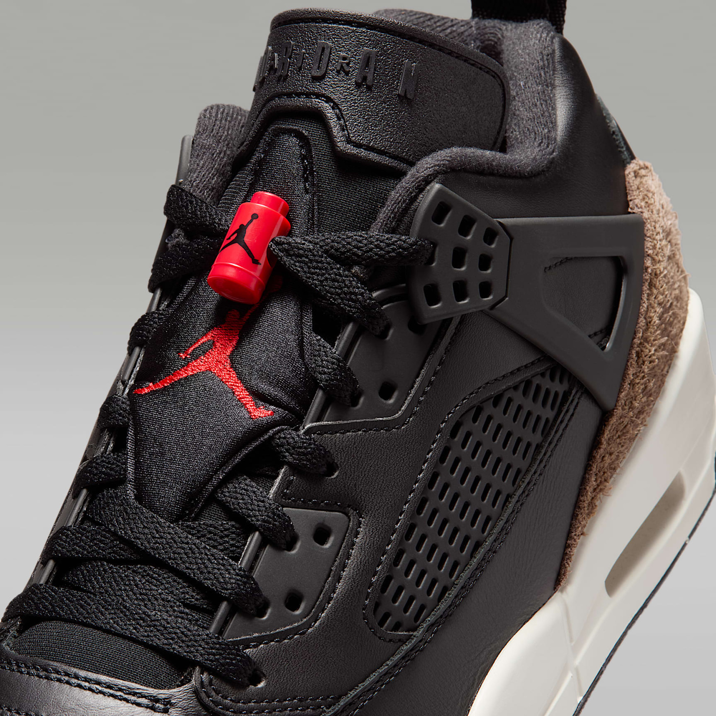 Jordan Spizike Low Herrenschuh – Schwarz/Palomino/Phantom/University Red