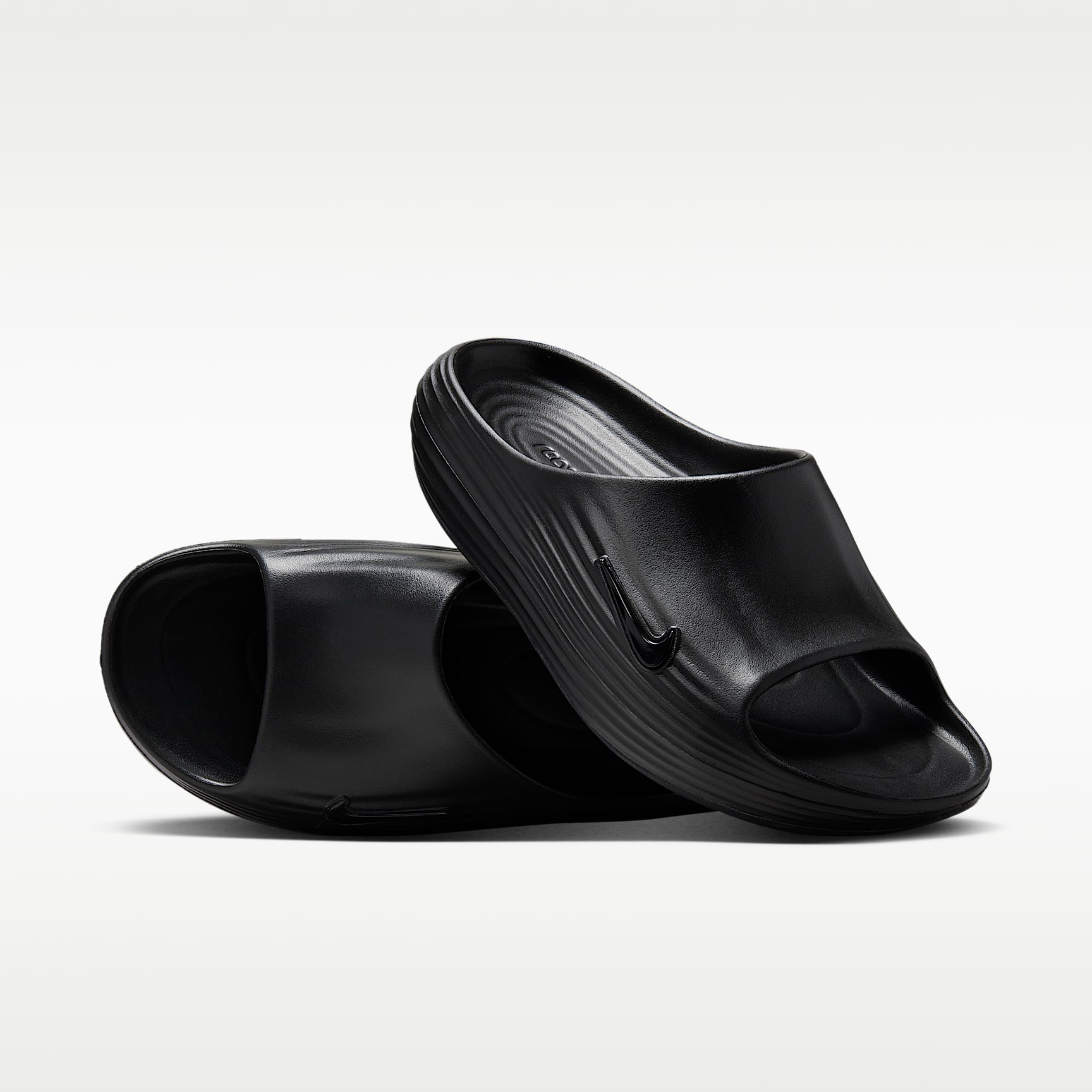 Nike ReactX Rejuven8 Slides (Herren) – Schwarz/Schwarz/Schwarz