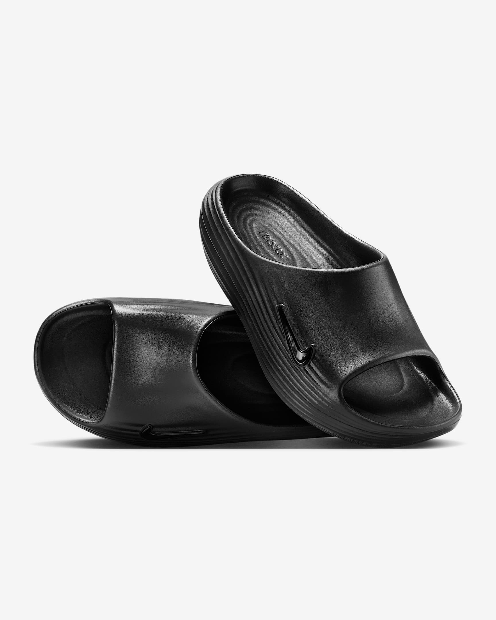 Nike ReactX Rejuven8 Slides (Damen) – Schwarz/Schwarz/Schwarz
