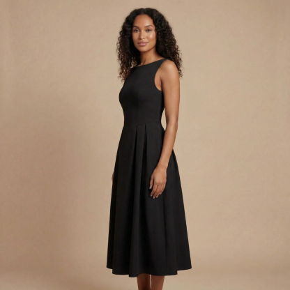 Side view of black midi dress showing sleeveless design and flowing midi length