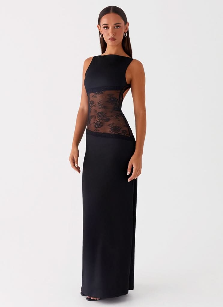 Black maxi dress with lace waist cutout, side view