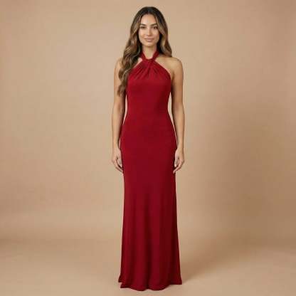 Deep red halter ruched maxi dress with gathered neckline and flowing floor-length skirt