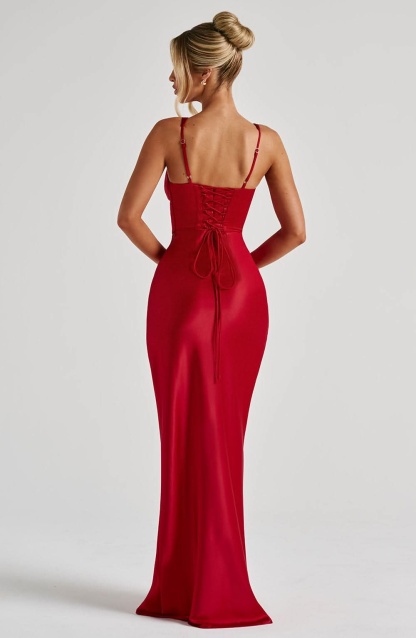 Back view of red corset maxi dress showing lace-up corset detail