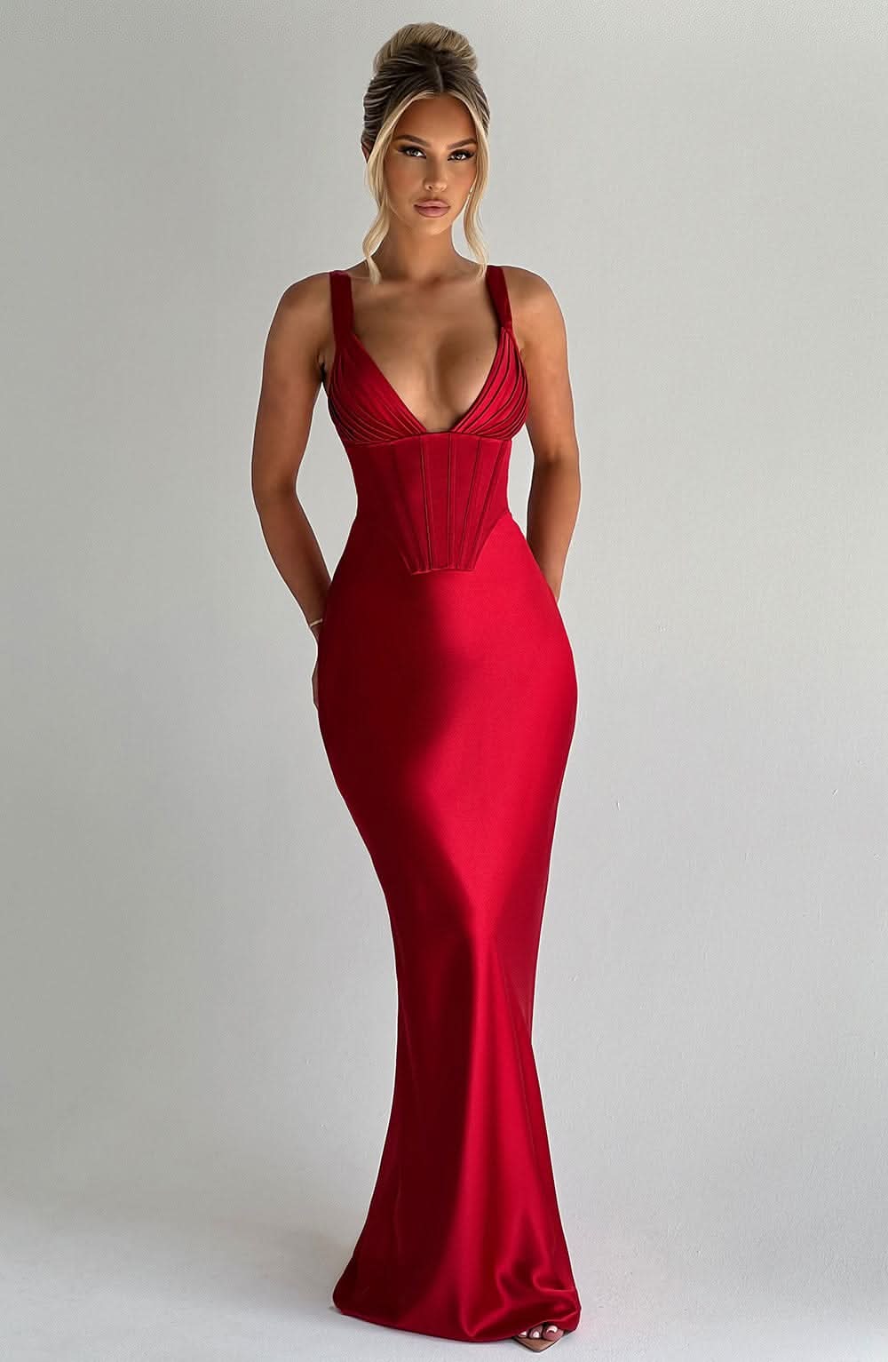 Red corset maxi dress with structured boning and deep V-neckline