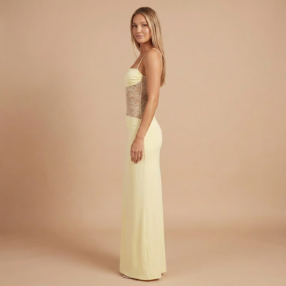Side view of pale yellow maxi dress with mesh lace panel