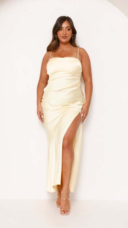 Cream maxi dress with ruched bodice and high leg slit front