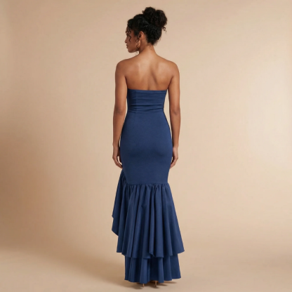 Back view of navy strapless maxi dress with tiered ruffle layers