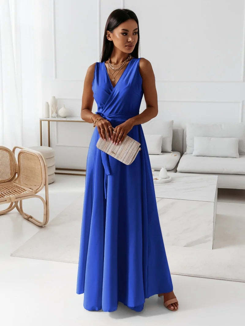 Royal blue wrap maxi dress with sleeveless v-neckline and tie waist