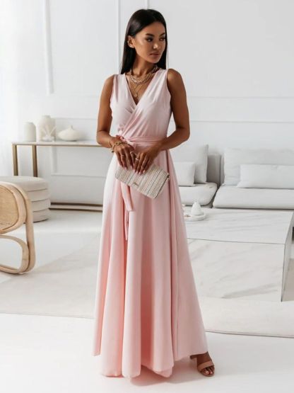 Blush pink wrap maxi dress with sleeveless v-neckline and flowing skirt