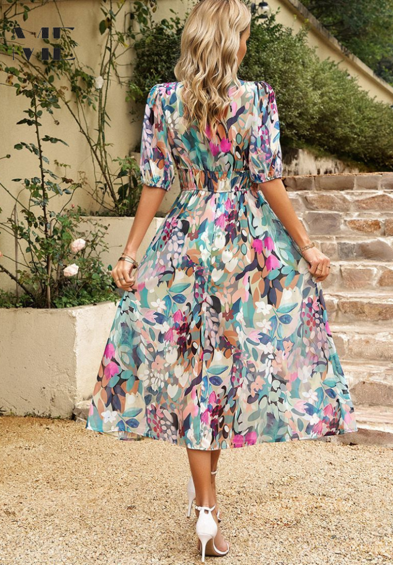 Back view of multicolor floral midi dress with gathered waist