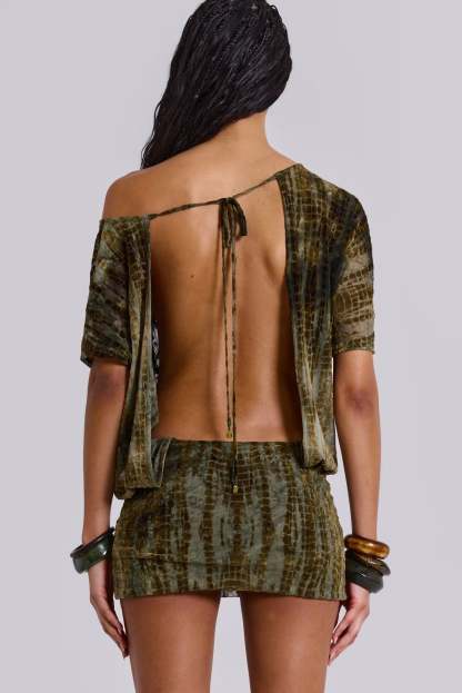 Back view of olive mini dress with open-back tie detail and bare back design