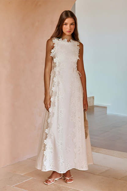 White eyelet lace maxi dress with high neckline and ruffled trim for women