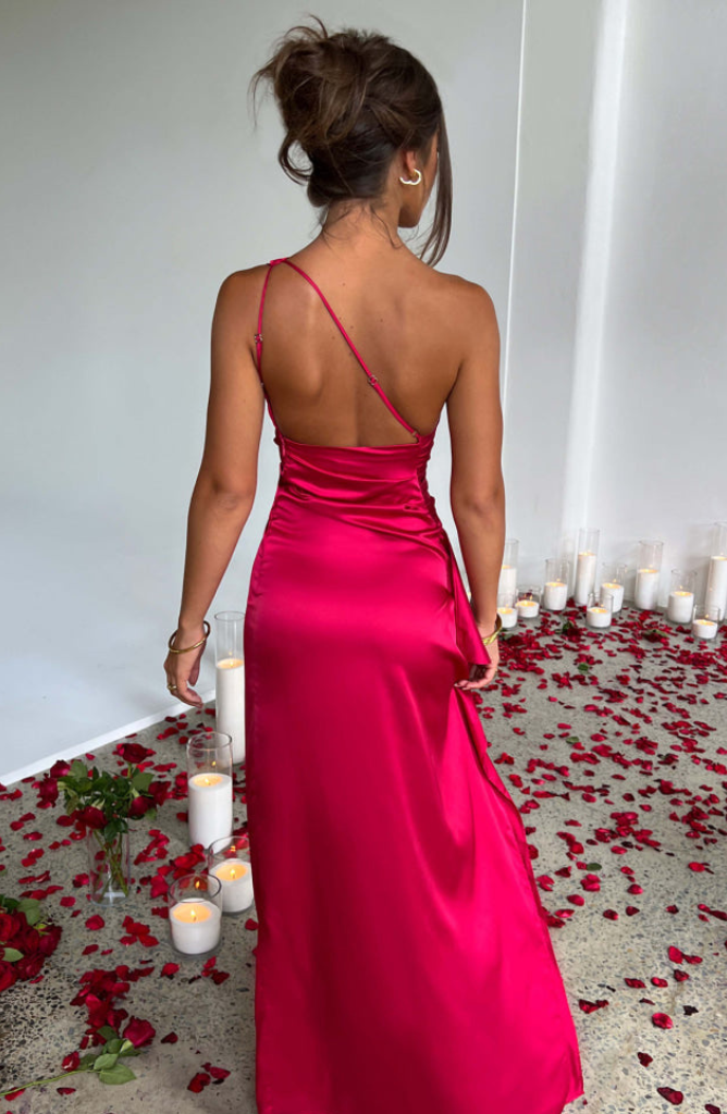 Magenta ruched maxi dress with open back and thin straps, floor-length silhouette