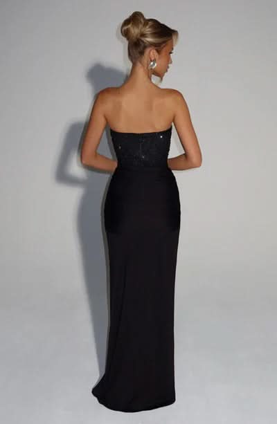 Back view of black sequin strapless maxi dress