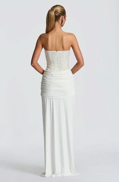 Back view of ivory sequin maxi dress with open back