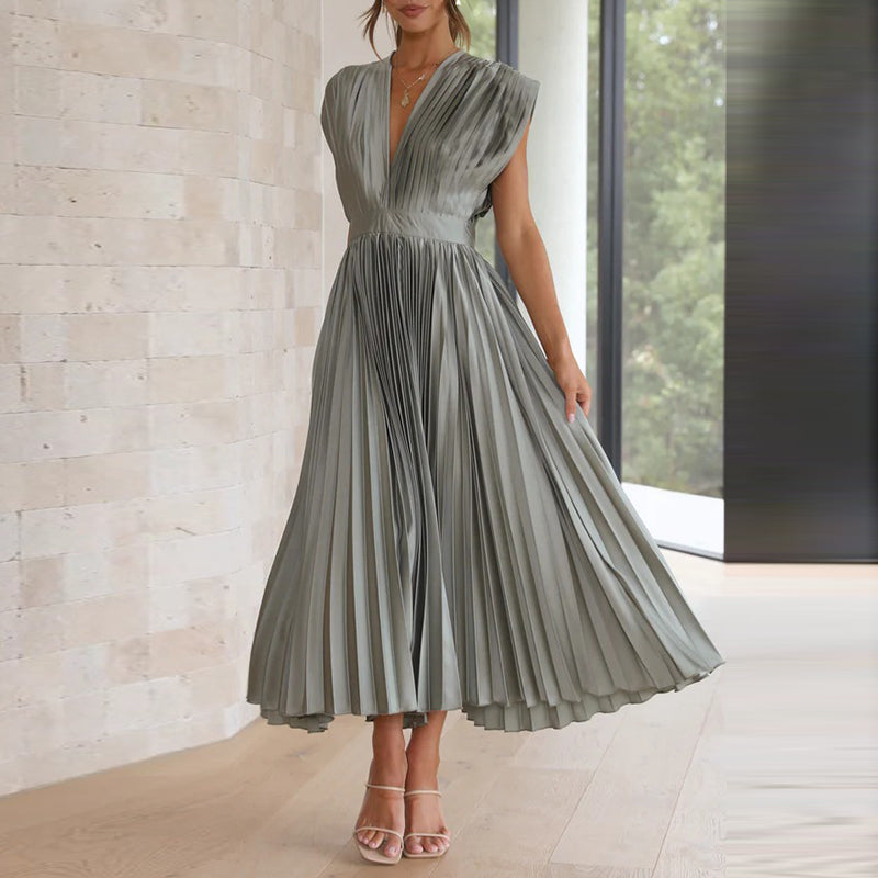 Sage green pleated midi dress with V-neckline and cap sleeves