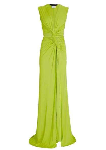 Chartreuse sleeveless maxi dress with twisted cutout at waist and floor-length hem