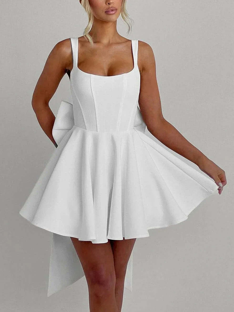 Cream mini dress front detail showing structured bodice and full skirt